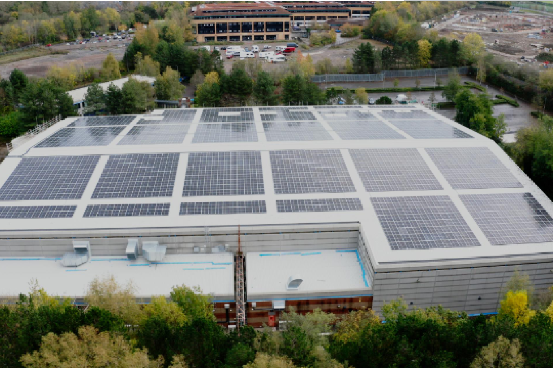 A redeveloped building that has had thousands of solar panels installed on its roof