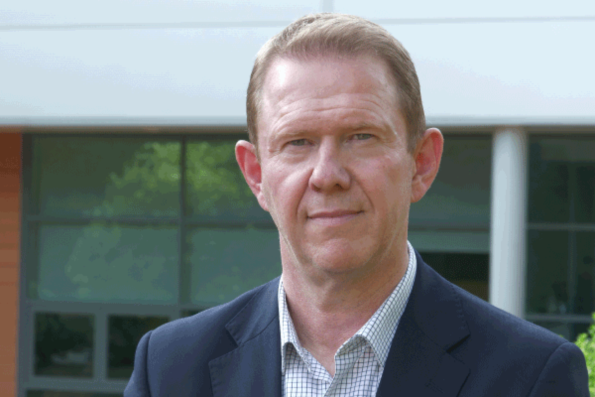 The CEO of The Midcounties Co-operative stood outside the head office