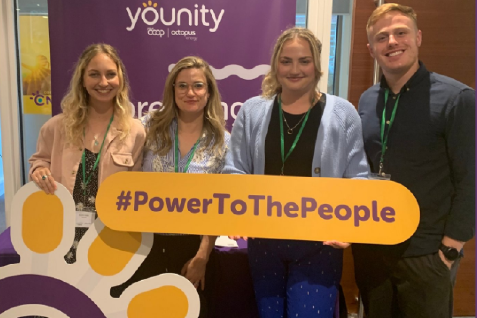 Younity team members networking and sharing insights on renewable energy at the conference.