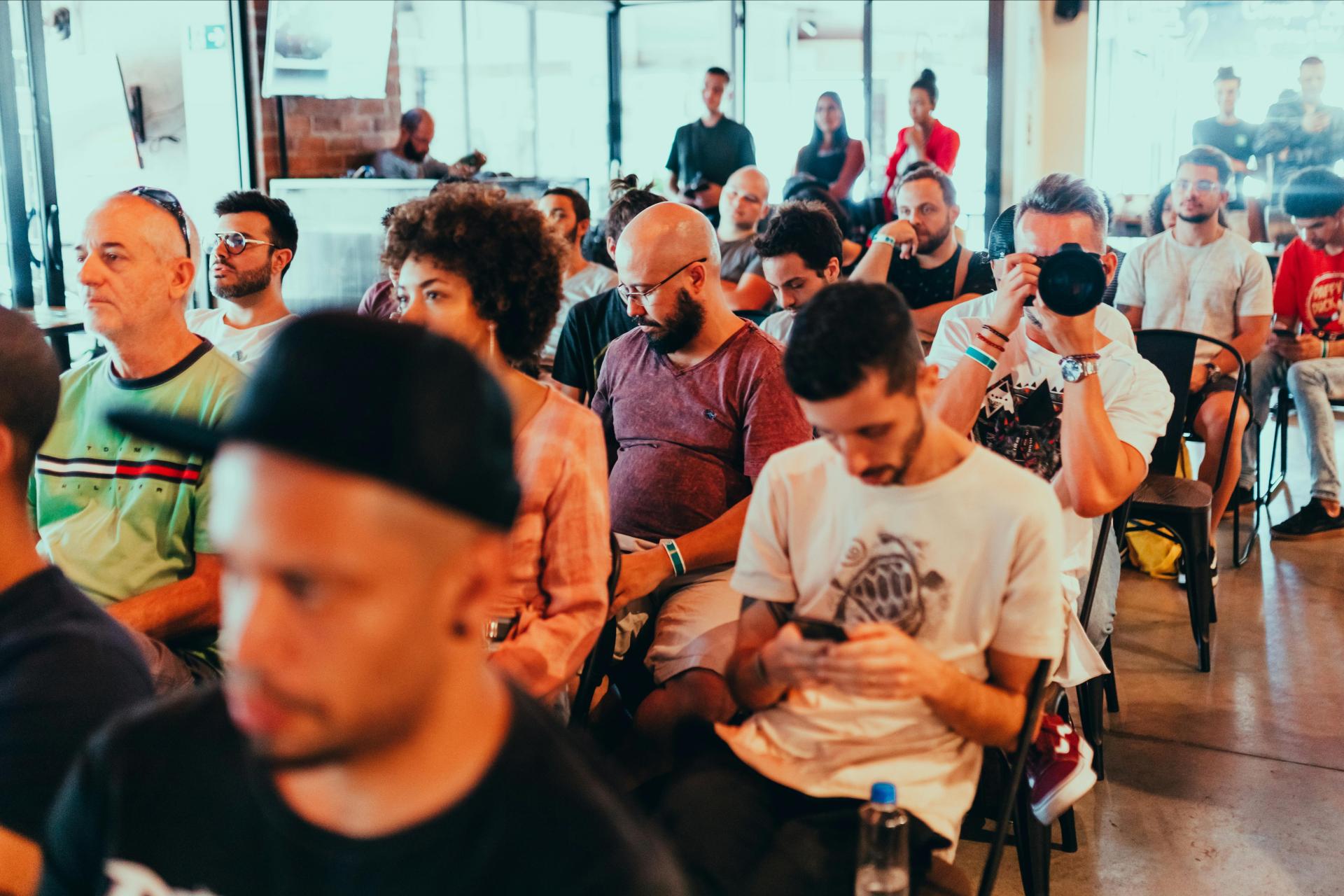 People at a conference taking a picture