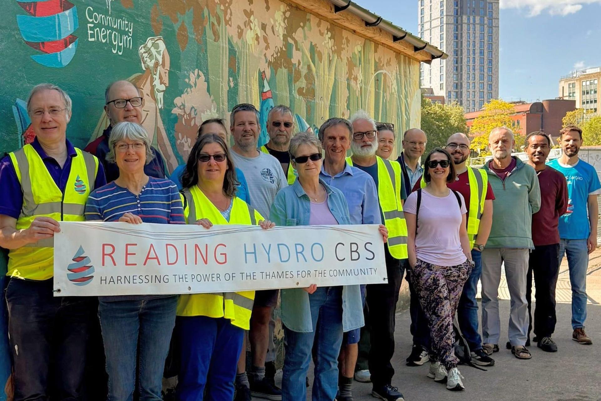 The Reading Hydro CBS team holding a banner.