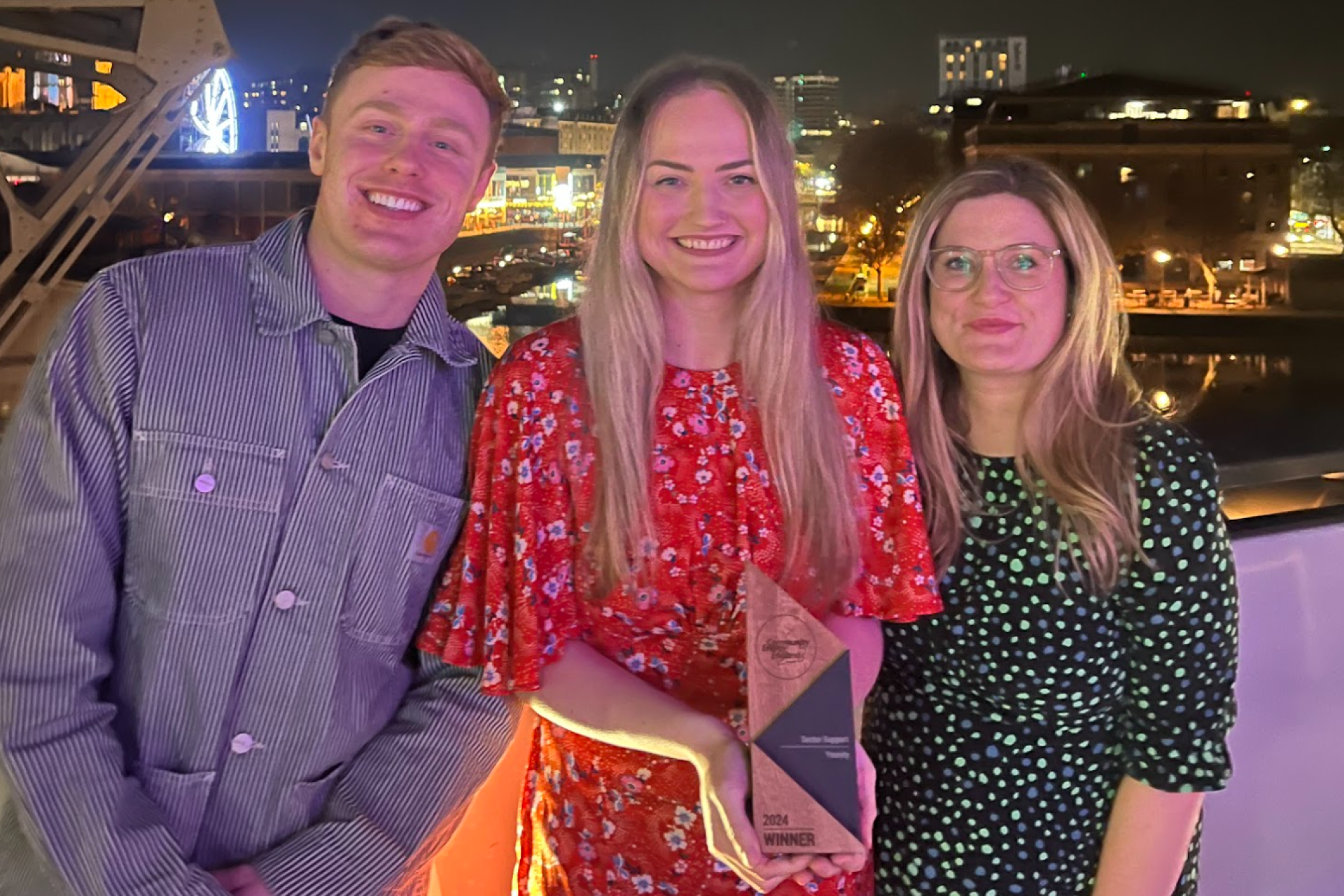 The Younity team holding their Sector Support Award at the 2024 Community Energy England Awards.