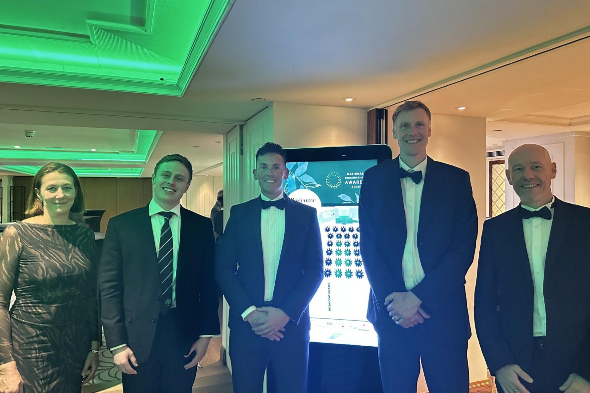 Younity team members, Ewan, Digital Marketing Lead and Laura, Senior Innovation and Proposition Manager, in black tie at an awards evening.